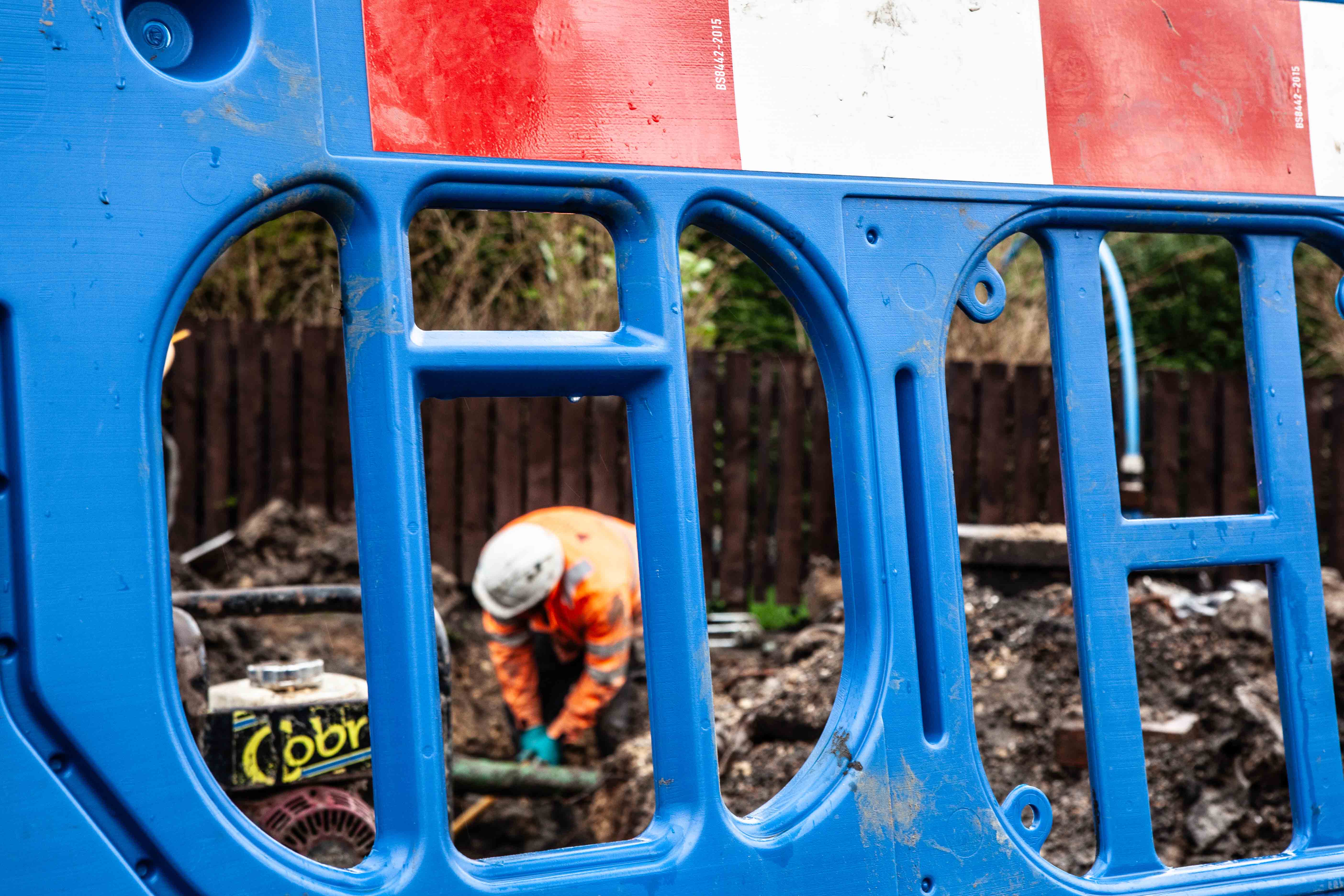 man digging in ground