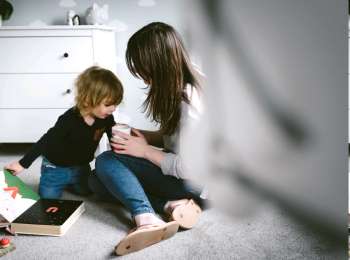 Mother and child playing on the floor