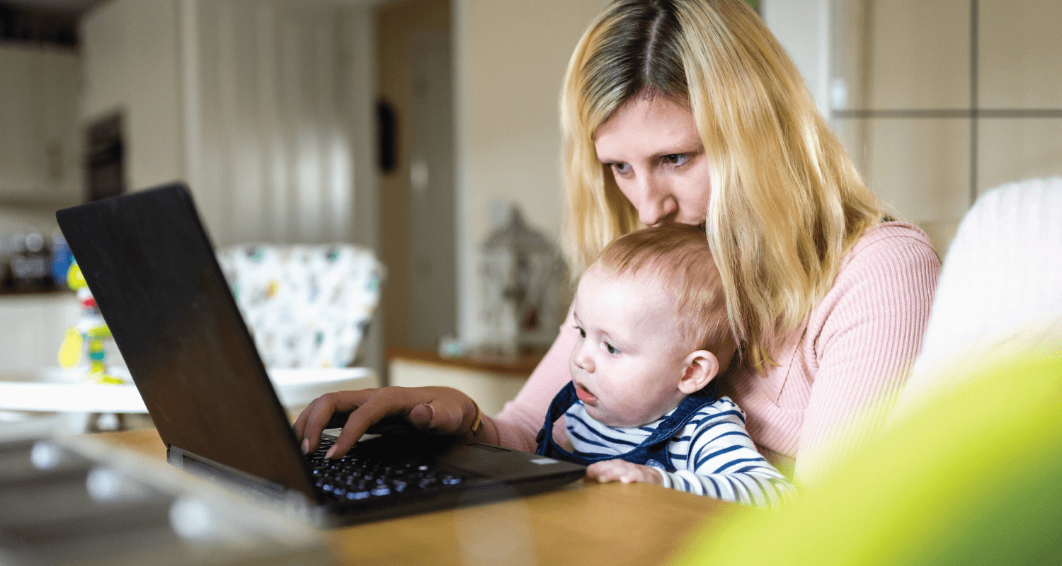 Mum with baby on laptop