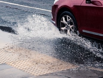 car driving through water