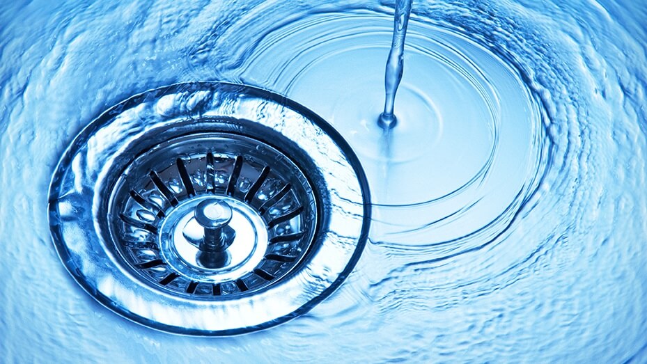 Water running down plughole